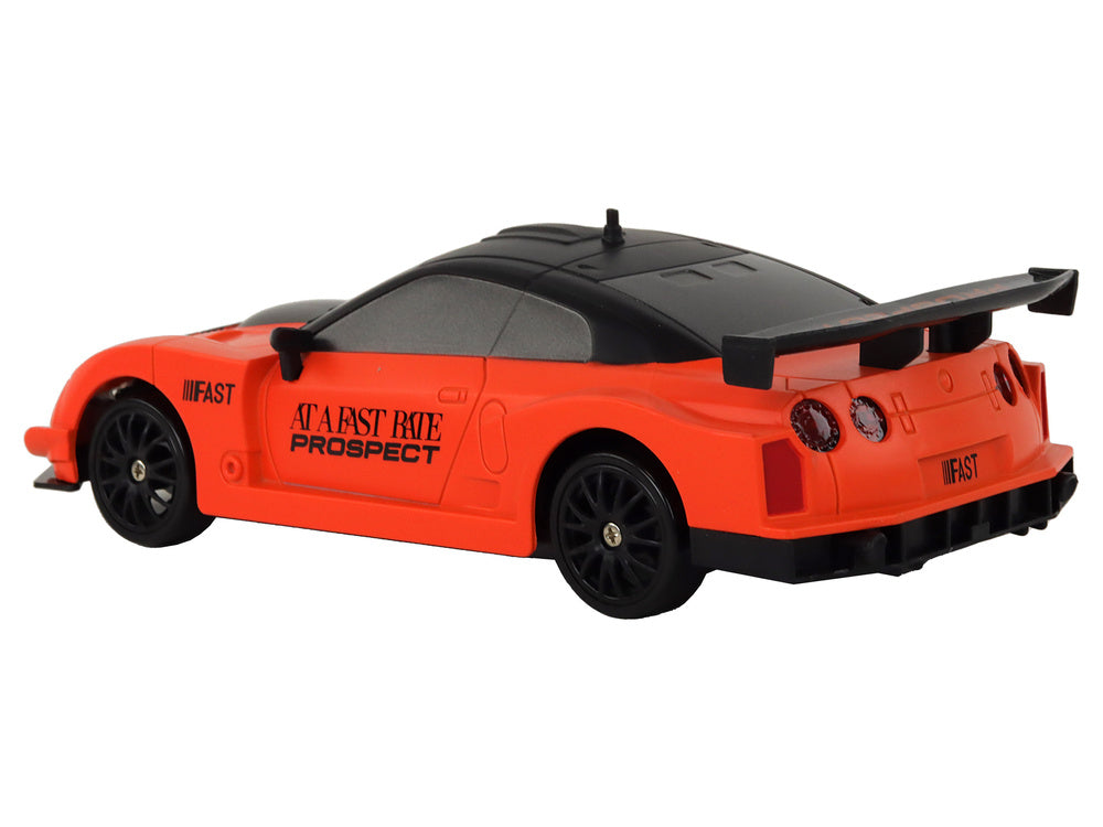 Auto na daljinsko upravljanje R/C 1:24  s izmjenjivim kotačima - narančasti