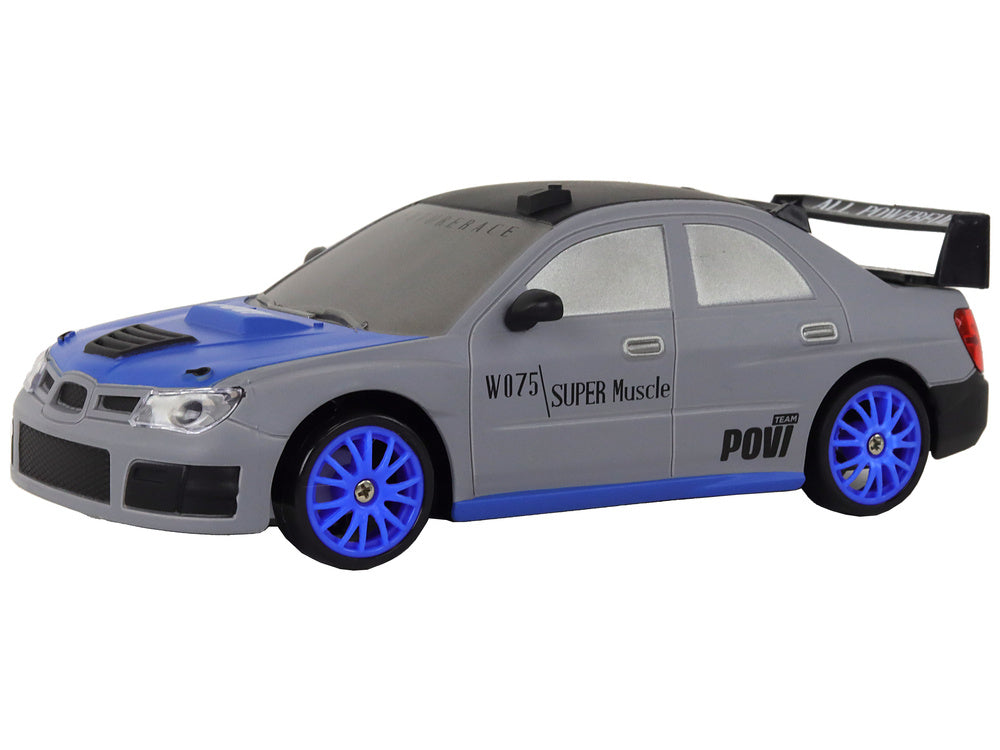 Sportski automobil na daljinsko upravljanje R/C 1:24 sa zamjenjivim kotačima - sivo/plavi