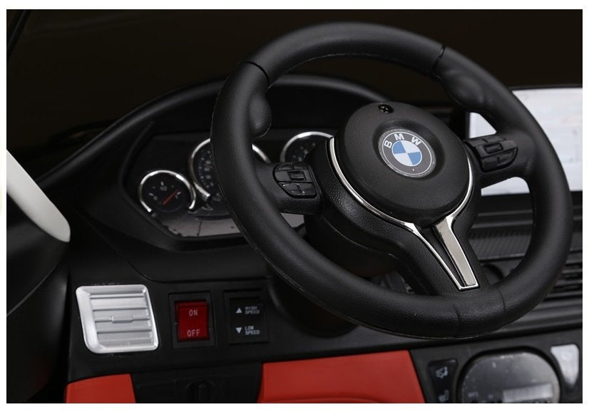 Licencirani auto na akumulator BMW X6M - dvosjed - crni/lakirani